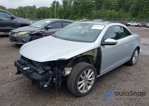 2012 Volkswagen Eos Komfort from USA, damaged, VIN WVWBW7AH7CV016403